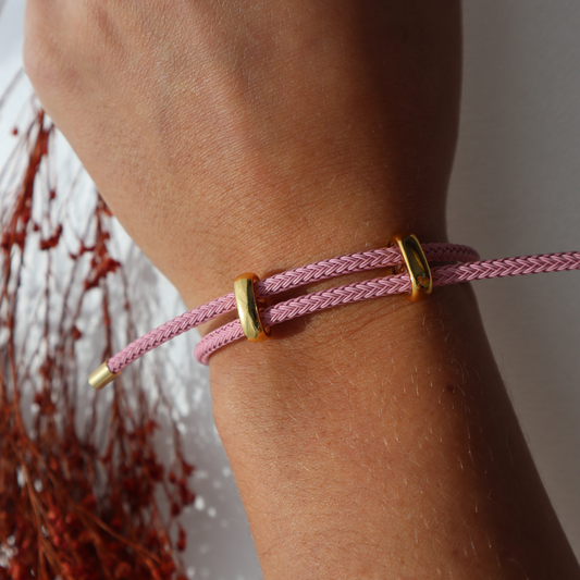 Adjustable Pink Bracelet with Gold Accents